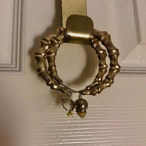 Gold Clip-On Bamboo Earrings.